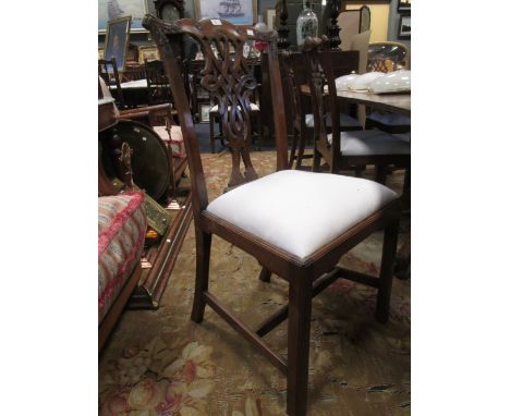 A set of eight mahogany Chippendale style dining chairs to include two carvers  