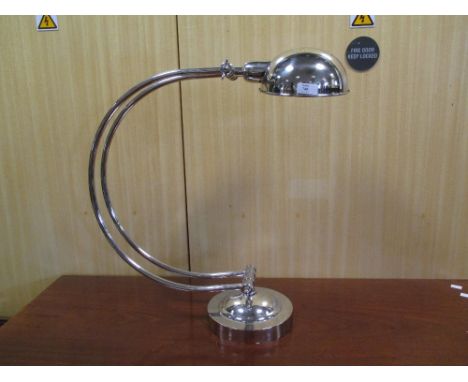 A large half moon shape Art Deco style desk lamp  