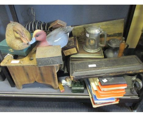 A miscellaneous lot to include a decanter drying stand, two hand carved and painted ducks, an early jigsaw, metalware and oth