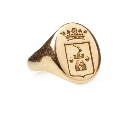 SIGNET RING, the oval bezel 15mm long, with a coat of arms featuring a central castle motif with arm protruding and hand gras