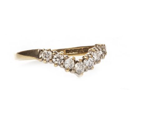 DIAMOND SET WISHBONE RING, set with round brilliant cut diamonds totalling very approximately 0.12 carats, in nine carat gold