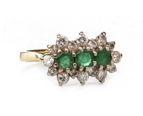 GREEN GEM AND DIAMOND DRESS RING, set with three central round faceted green gems each 3.5mm diameter, within a diamond borde