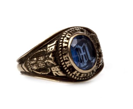 BLUE GEM SET COLLEGE RING, set with a faceted oval blue gem reverse carved with monogram, with 'Hartford Public, HPHG' to the