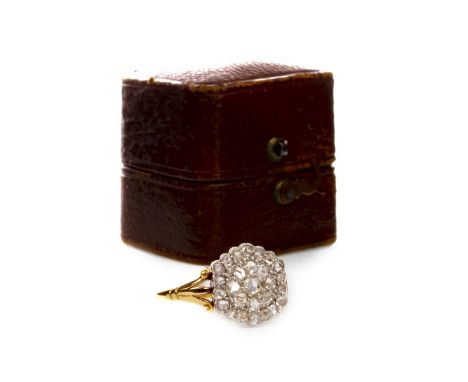 EARLY TWENTIETH CENTURY DIAMOND CLUSTER RING, the hexagonal bezel 12mm wide and set with rose cut diamonds, on trifurcated sh
