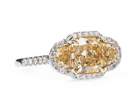 YELLOW AND WHITE DIAMOND RING, the central cushion cut yellow diamond of approximately 2.20 carats with accompanying certific