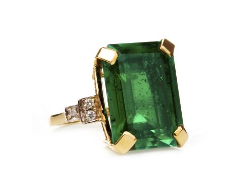 GREEN GEM AND DIAMOND RING, set with a large emerald cut green gem 19.8x14.8mm, on diamond shoulders, marked 375, size M, 10.