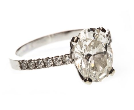 DIAMOND SOLITAIRE RING, set with an oval brilliant cut diamond of 2.02 carats with accompanying photocopy of GIA Report 11782