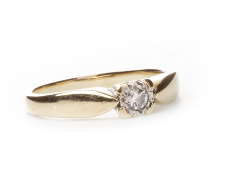 DIAMOND SOLITAIRE RING, with an illusion set round brilliant cut diamond of approximately 0.08 carats, in nine carat gold, si