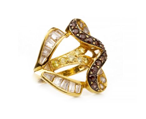 MULTI GEM SET RING, the open bezel with looping brown gem set sections and tapering white gem set sections, the bezel 21mm sq