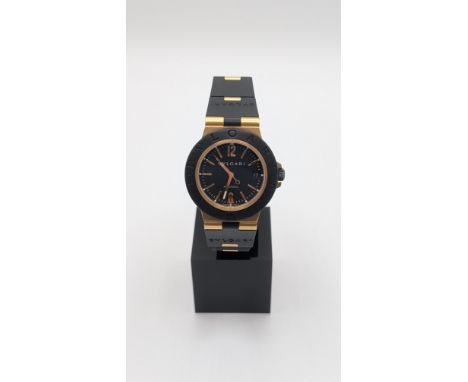 Bulgari Diagono AL 38 G, Yellow Gold/ black dial with gold/rubber strapRef. AL 38 G, L2597Does not come with box or papers.
P