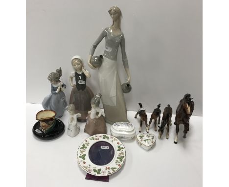 A collection of five various Nao porcelain figures, a Beswick horse figure and three foals, a Wedgwood "Wild Strawberry" deco