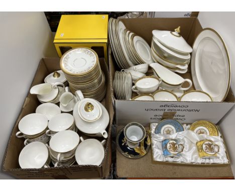 A quantity of Royal Doulton Royal Gold dinner wares comprising eight dinner plates, seven side plates, seven twin handled sou