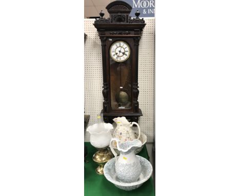 A 19th Century Vienna type regulator with circular enamel dial and Roman numerals, approx 115 cm high, together with a brass 
