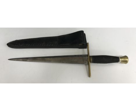 A 20th Century Templar dagger/side piece with rope work grip to the brass handle and tapered blade, blade length 30.5 cm, ove