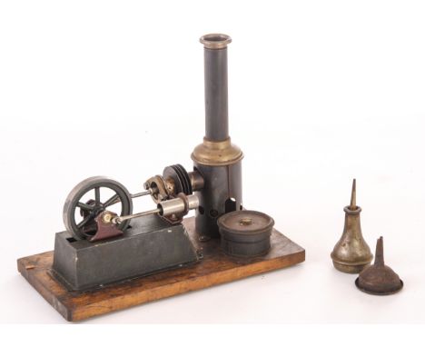 A Schönner Hot-Air engine, Cat. Ref. 156/11, fitted on a wooden plinth apx. 8in x 4½in and apx. 8in high over chimney not tra