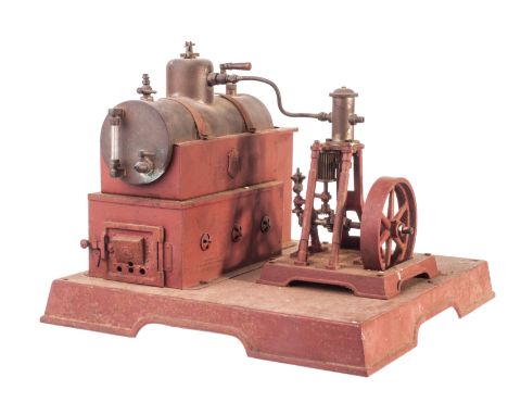 A Märklin stationary steam plant, mostly repainted in red oxide, with brass boiler apx. 3in diameter x 7½in long, with weight