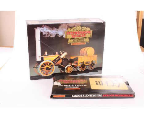 A Hornby 3½in gauge live steam ‘Rocket’ set with additional track: a boxed set locomotive, tender, 25 feet of track, instruct