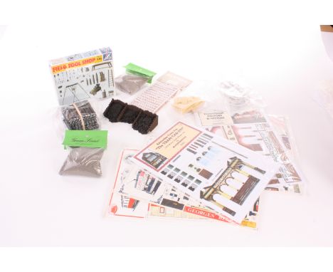 A collection of 0 Gauge card kits and scenic items, including London E/1 tram kit, Bristol trams, CDR ‘Phoenix’ locomotive, v