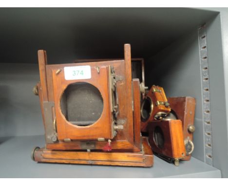 A mahogany cased Thornton Pickard field camera etc