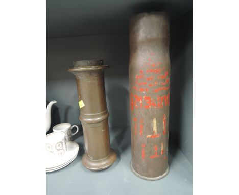 A large vintage military shell and similar cast fitment1907 Karlsruhe 386
