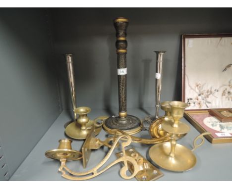 A selection of vintage brass cast and similar candle sticks