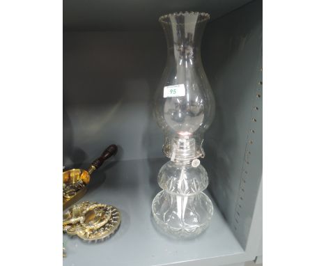 A vintage oil burning lamp