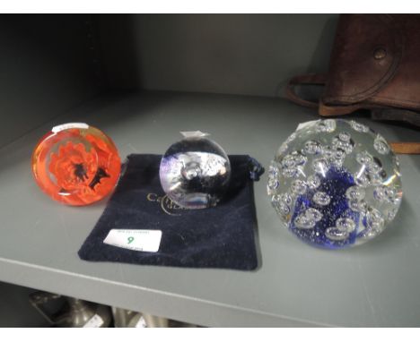 A selection of vintage glass paper weights by Caithness and similar including Red Poppy