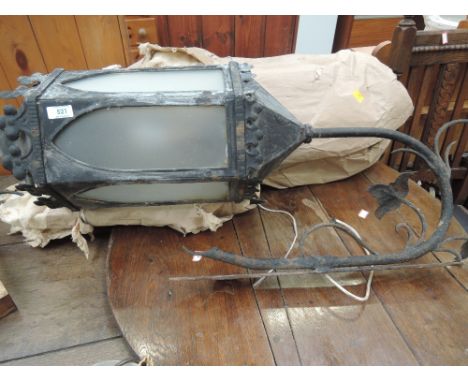 A pair of traditional metal outdoor light fittings (sold as decorative untested)