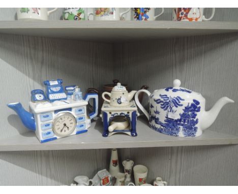A selection of vintage teapots in various designs