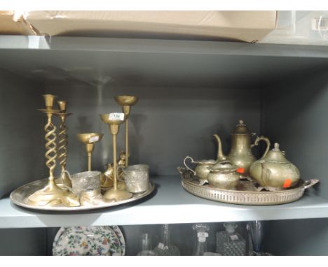 A selection of vintage brass cast candle sticks