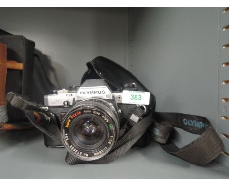 An Olympus OM 10 camera