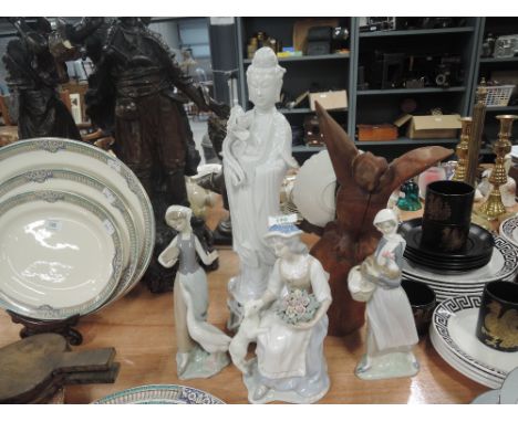 A selection of vintage figures and figurines including Lladro