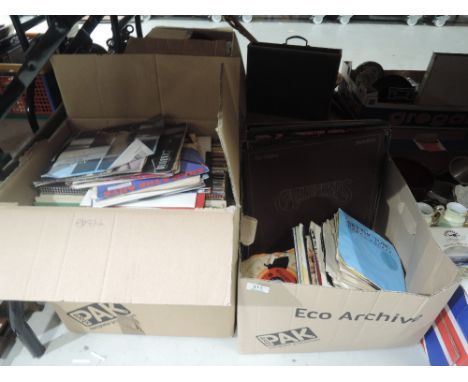 Two boxes of vintage vinyl records and 45rpm singles rock and pop mixed