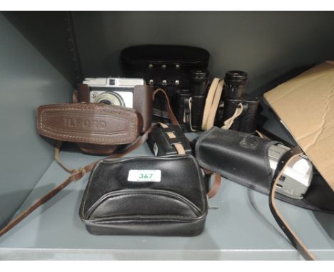 A pair of Russian binoculars, an Ilford Sporti camera, a Hanimex 35MD and a Praktika SK600