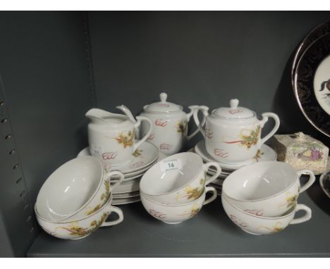 A vintage part egg shell tea service with dragon decoration