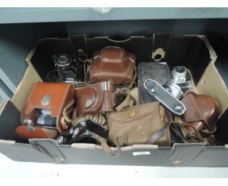 A box of cameras including an Agfa Colourflex in leather case, an Agfa folding camera with Campur shutter, an Edixa mat kadet