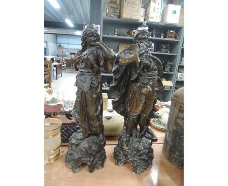 Two vintage plaster cast Russian style figures