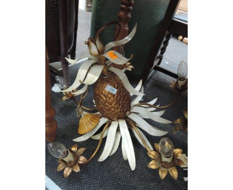 A metal ceiling light fitting of pineapple form (sold as decorative untested)