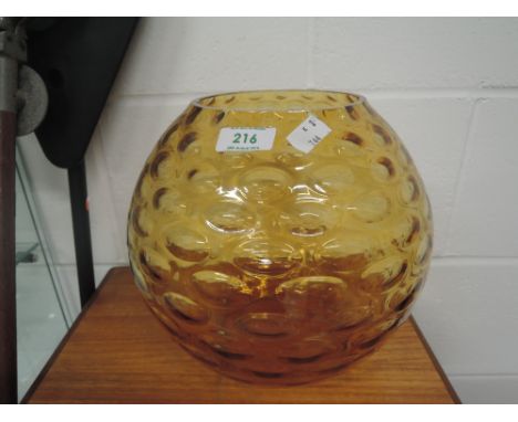 A vintage yellow glass bowl