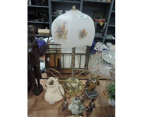 A selection of vintage figures and table lamp