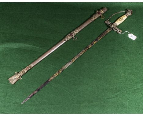 A Knight's Templar Masonic sword with ivory handle and engraved blase together with an ornate scabbard