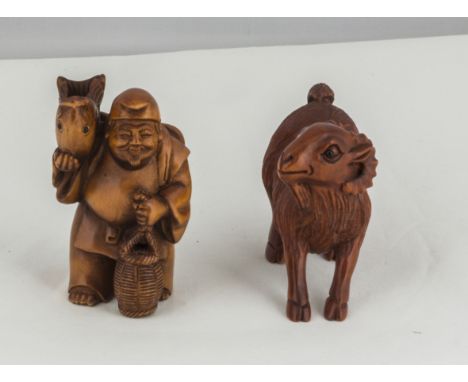 Two hardwood signed netsuke
