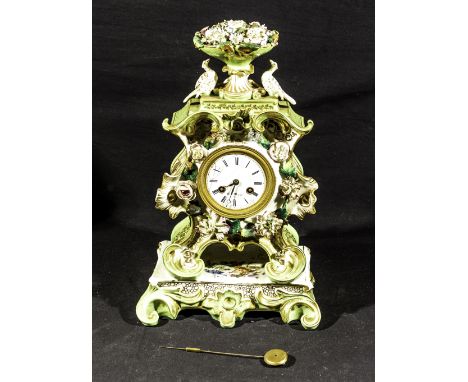 A French porcelain mantle clock, 37cm tall