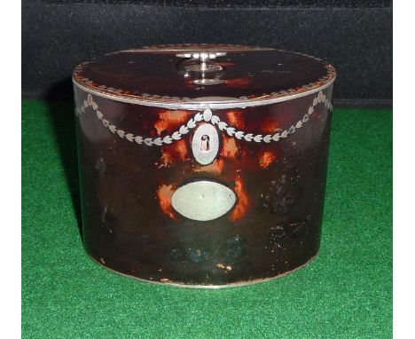 A simulated tortoiseshell silver mounted tin caddy