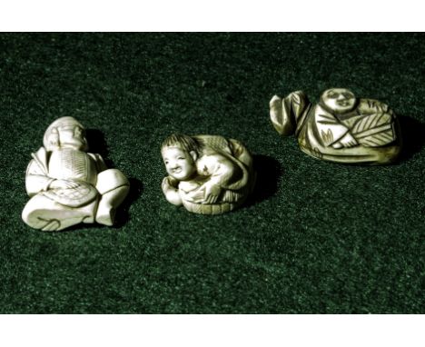 Three ivory signed netsuke