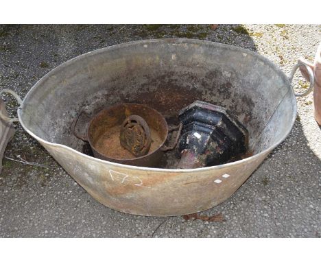 Galvanised bath with other items including a cast iron hopper and pan
