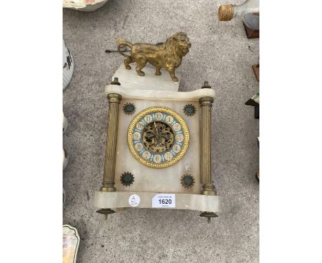 A MARBLE MANTLE CLOCK 