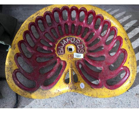 A BAMFORDS RED AND YELLOW TRACTOR SEAT 