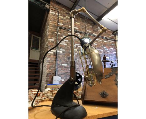 AN ANGLE POISE LAMP IN THE INDUSTRIAL STYLE 