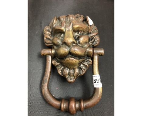 A GEORGIAN LION'S HEAD DOOR KNOCKER 